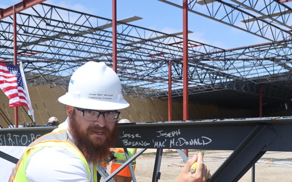 McDonald Signs Ceremonial Topping-Off Ceremony Beam In MCRD