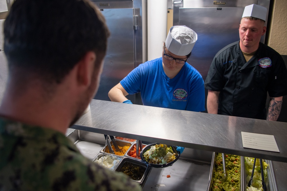 Ronald Reagan Culinary Specialists and Food Service Attendants Serve Lunch