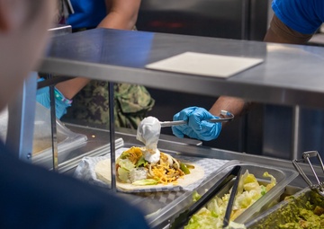 Ronald Reagan Culinary Specialists and Food Service Attendants Serve Lunch
