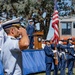 U.S. Coast Guardsman salutes colors during Southwest District Change of Command ceremony