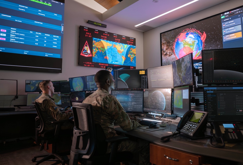 Combined Space Operations Center (CSpOC) staff monitor workstations. Combined Space Operations Center (CSpOC) staff monitor workstations.