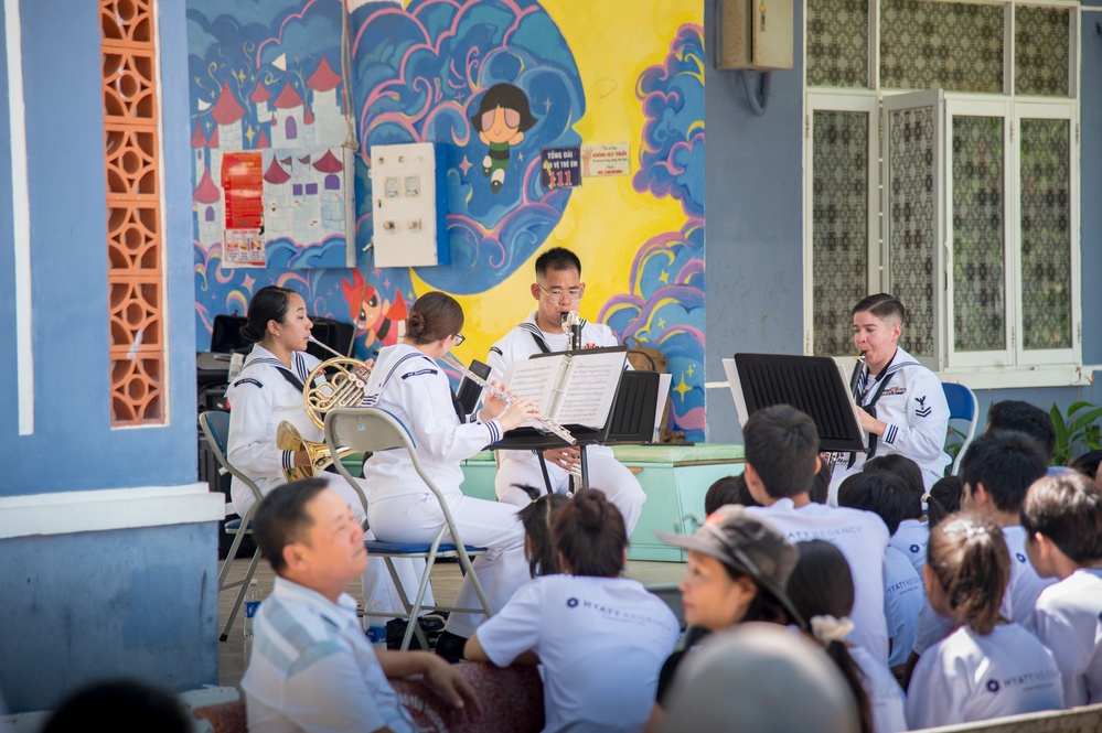 The U.S. 7th Fleet Band's Shiokaze Winds performs in Da Nang