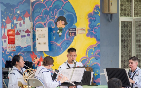 The U.S. 7th Fleet Band's Shiokaze Winds performs in Da Nang