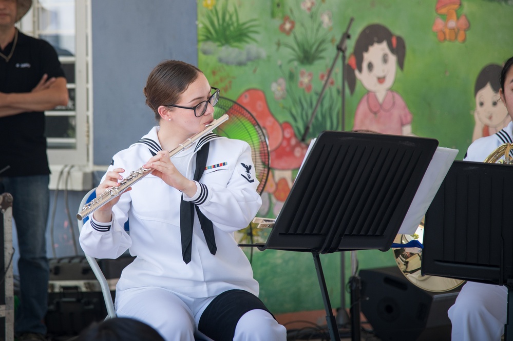 The U.S. 7th Fleet Band's Shiokaze Winds performs in Da Nang