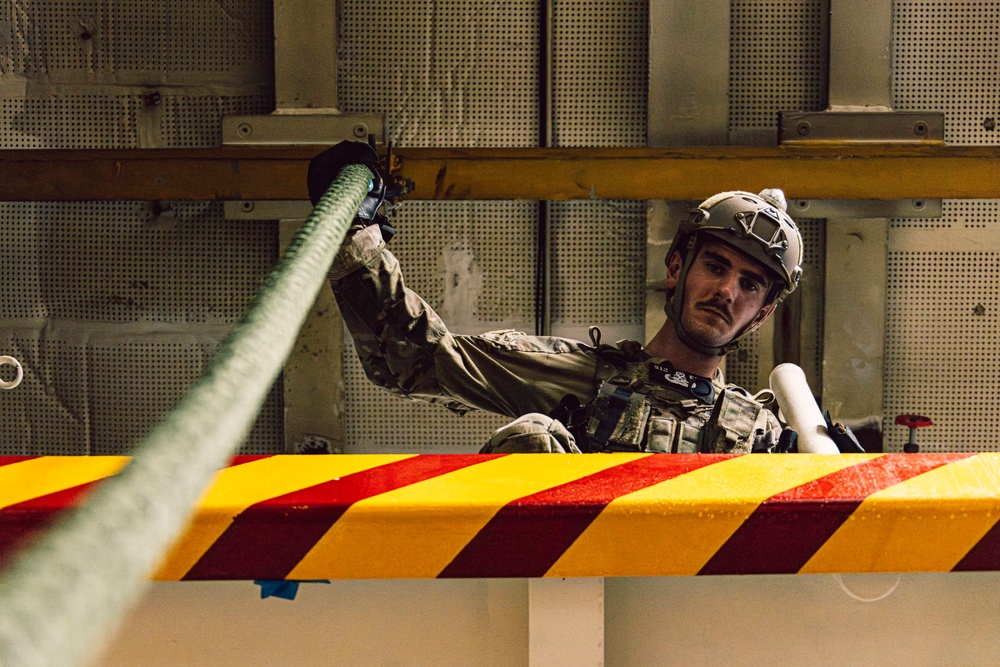 EODMU 5 Sailors Conduct Fast Rope Drills