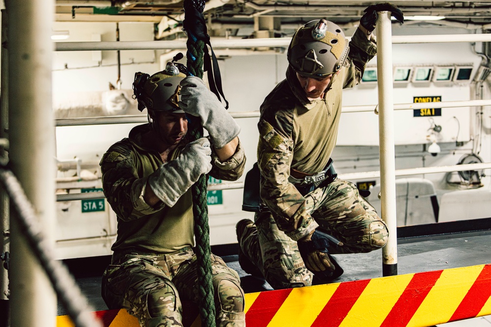 EODMU 5 Sailors Conduct Fast Rope Drills