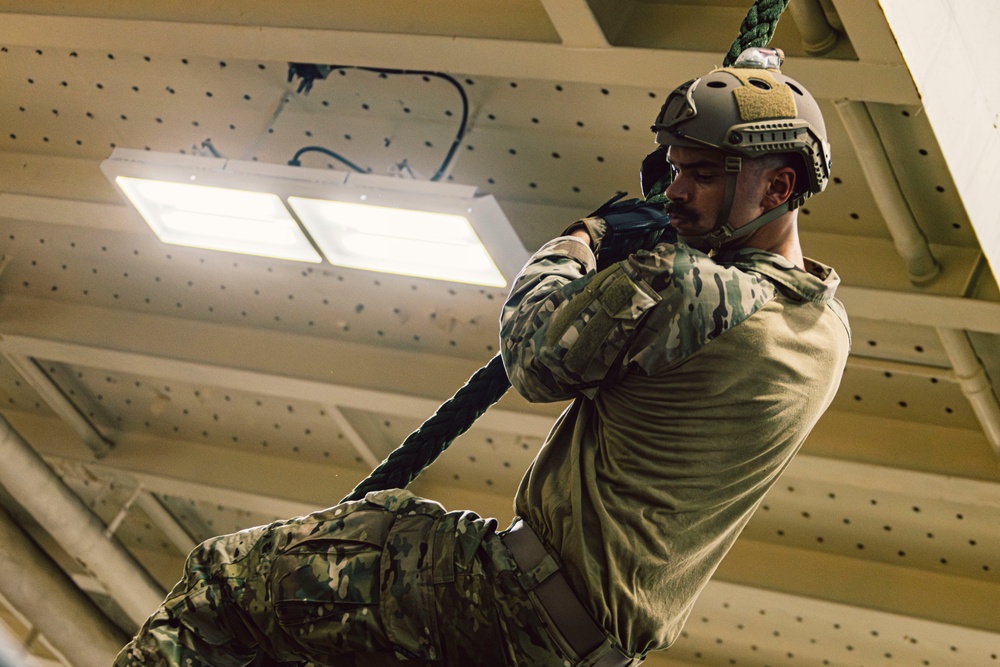 EODMU 5 Sailors Conduct Fast Rope Drills