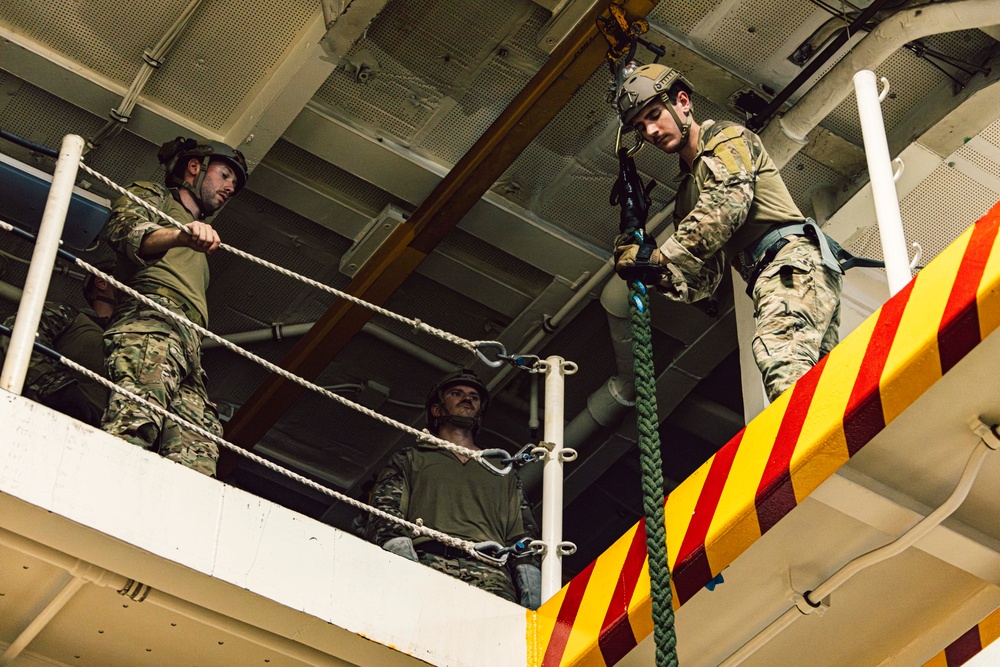 EODMU 5 Sailors Conduct Fast Rope Drills