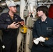 Sailors aboard the USS John Finn conduct an engineering training team drill in the South China Sea