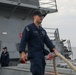 Sailors aboard the USS John Finn conduct a sea and anchor detail in Changi, Singapore