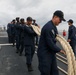 Sailors aboard the USS John Finn conduct a sea and anchor detail in Changi, Singapore