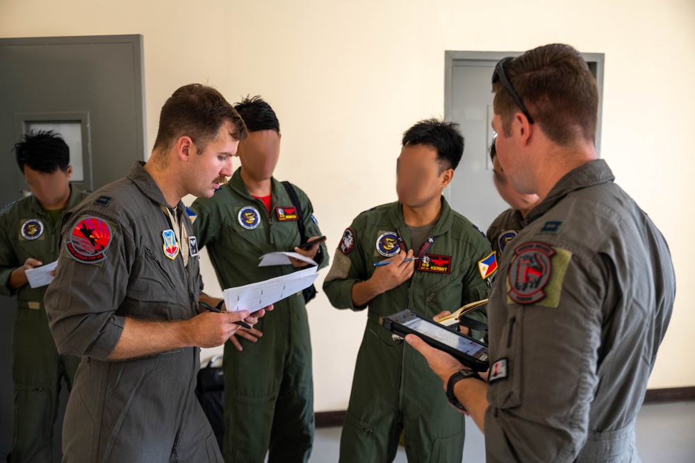 USAF F-35A Pilots Lead Fighter Maneuvers Brief During Cope Thunder 25-2