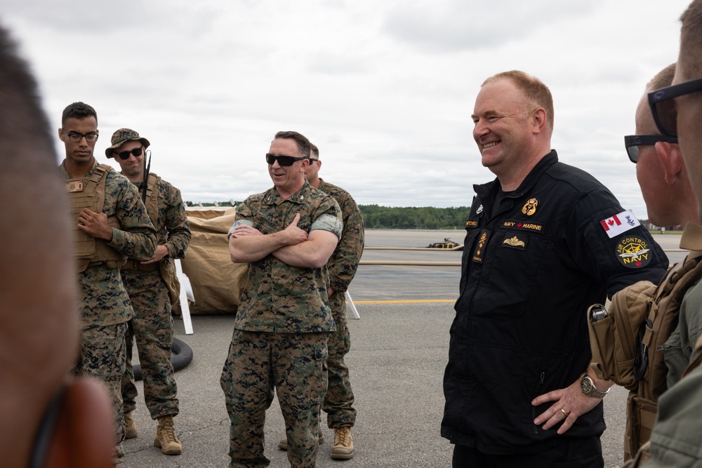 U.S. Marines with MWSS-273 refuel CH-53E Super Stallions with HMH-464