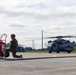 U.S. Marines with MWSS-273 refuel CH-53E Super Stallions with HMH-464