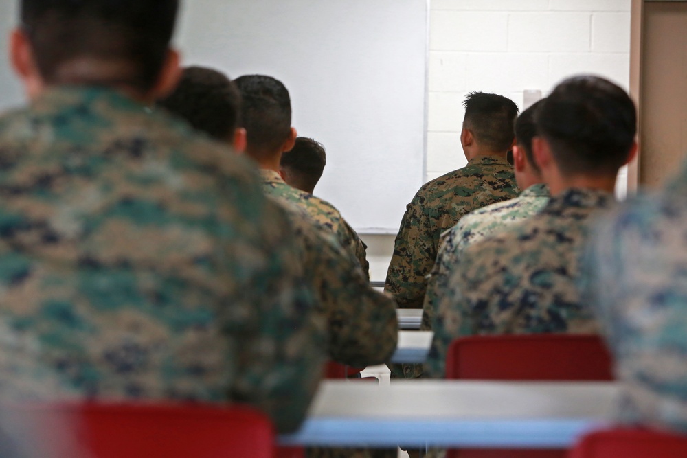 U.S. Marine Corporals and Lance Corporals Graduate Primary Military Education Courses