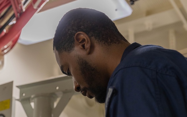 USS Gerald R. Ford (CVN 78) Sailor Conducts Maintenance
