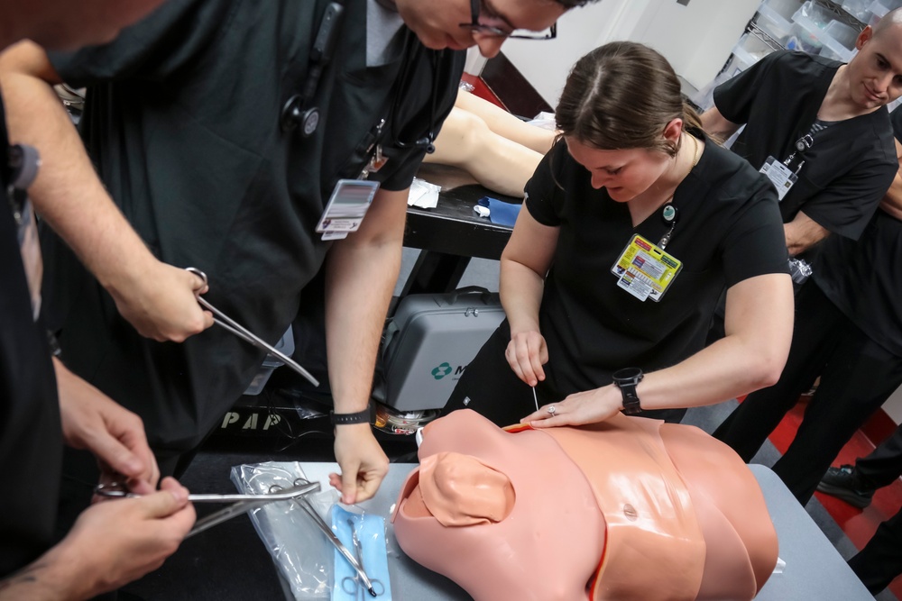 IPAP Students Practice Life-Saving Chest Tube Procedures
