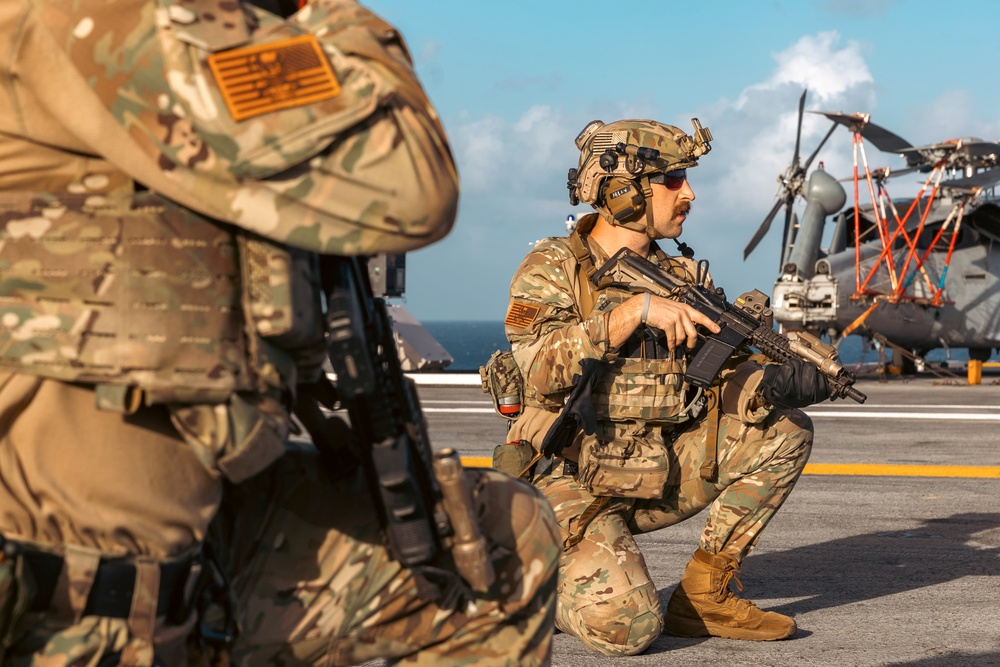 Carrier Strike Group 12 Explosive Ordnance Disposal Technicians Conducts Fast-Rope Exercise