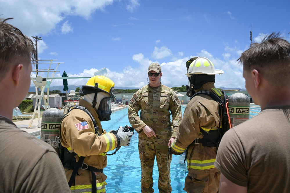 165th Airlift Wing firefighters conduct water survival training in Hawaii