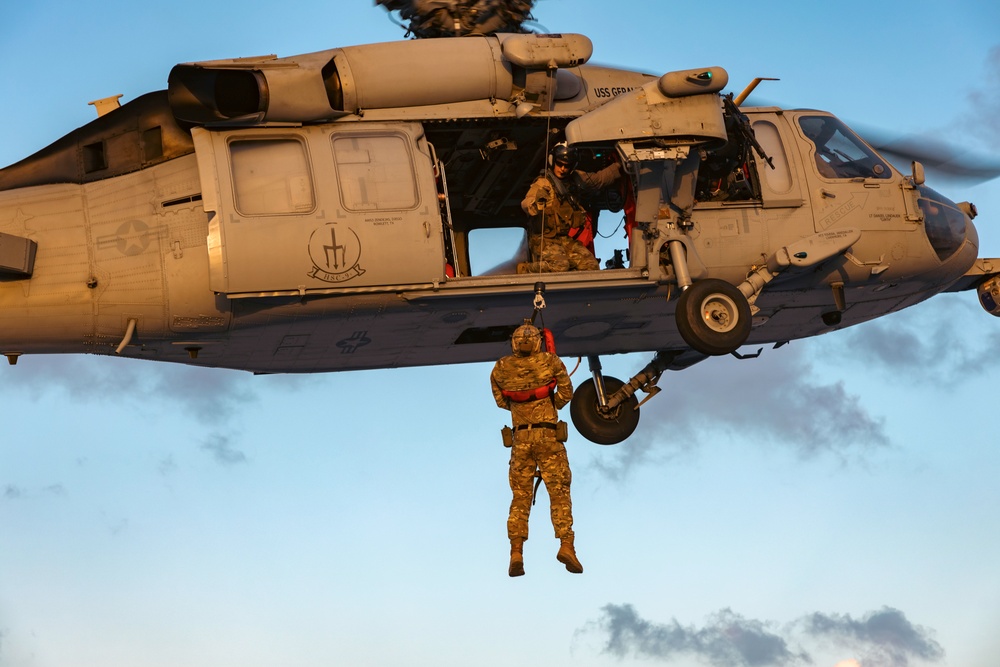 Carrier Strike Group 12 Explosive Ordnance Disposal Technicians Conduct Fast-Rope Exercise