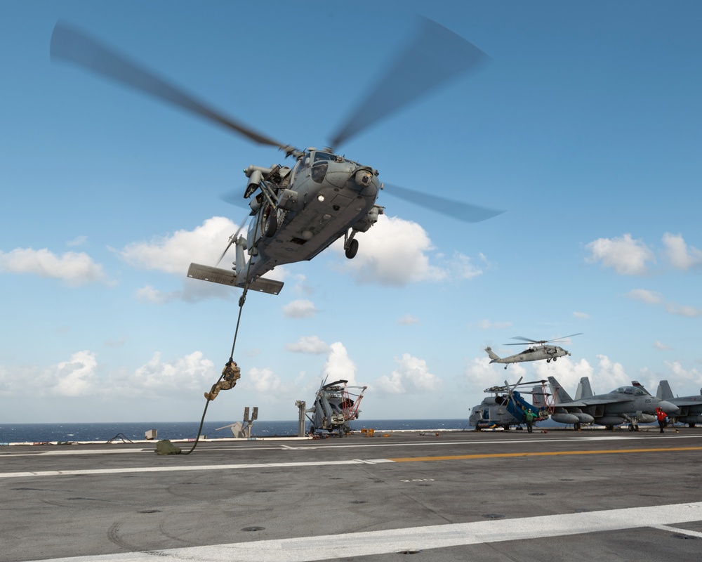 Carrier Strike Group 12 Explosive Ordnance Disposal Technician Conducts Fast-Rope Exercise
