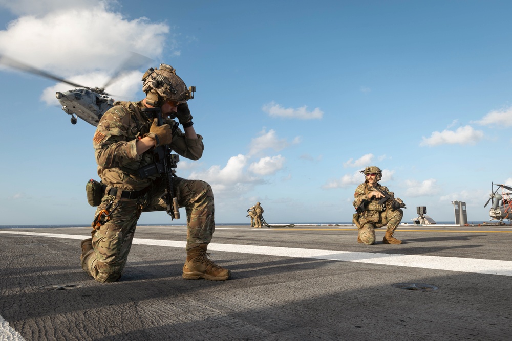 Carrier Strike Group 12 Explosive Ordnance Disposal Technicians Conduct Fast-Rope Exercise