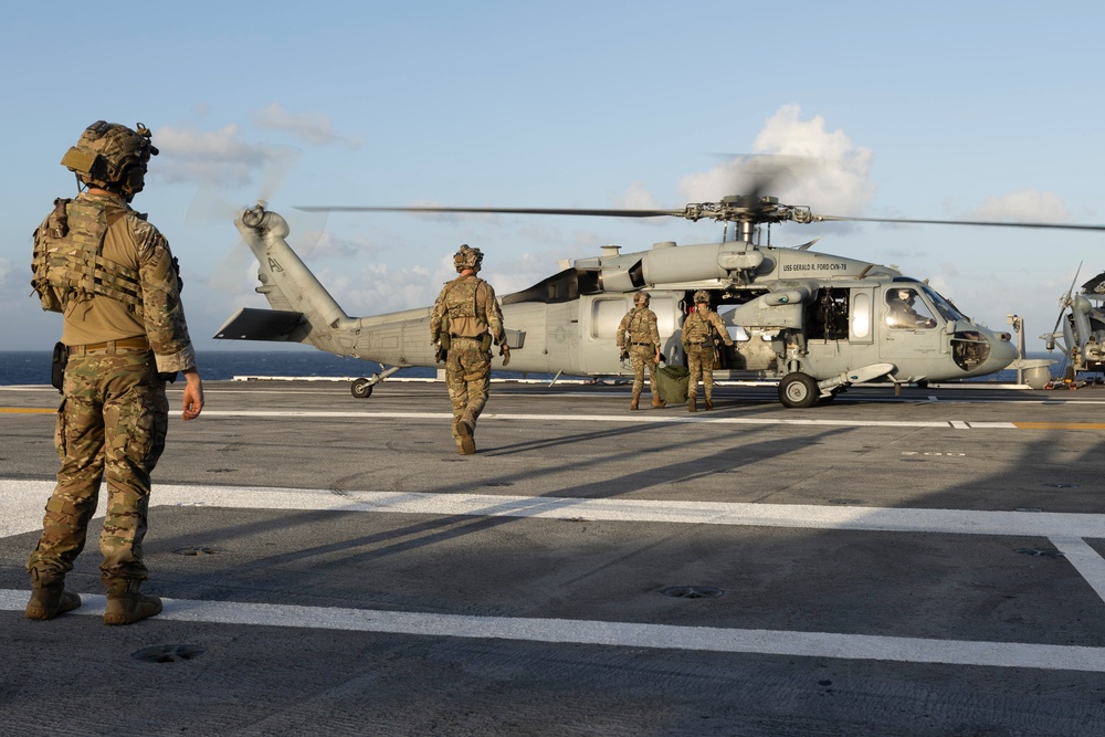 Carrier Strike Group 12 Explosive Ordnance Disposal Technicians Conduct Fast-Rope Exercise