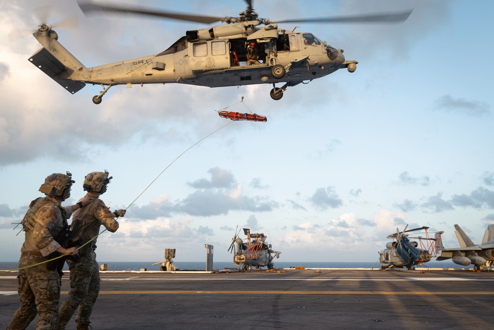 Carrier Strike Group 12 Explosive Ordnance Disposal Technicians Conducts Fast-Rope Exercise