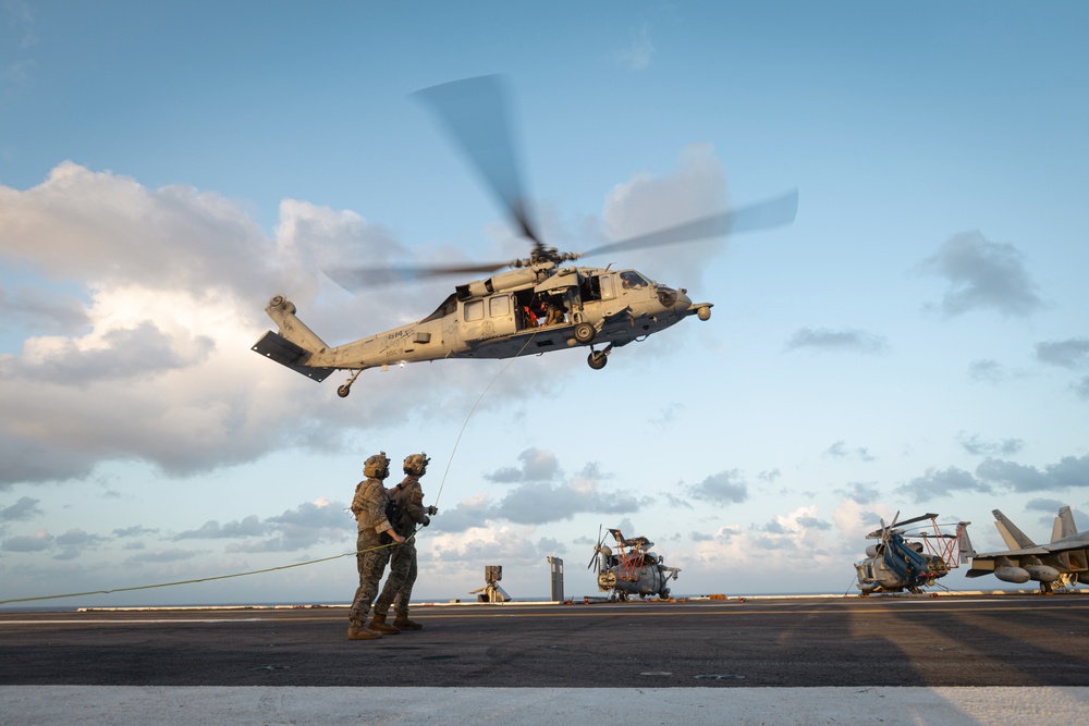Carrier Strike Group 12 Explosive Ordnance Disposal Technicians Conduct Fast-Rope Exercise