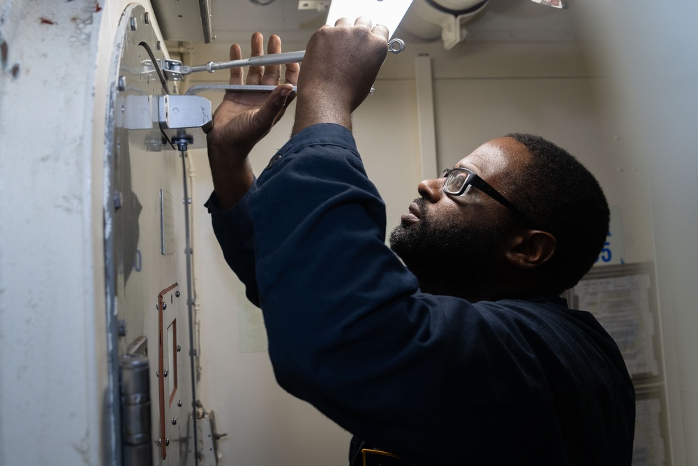 USS Gerald R. Ford (CVN 78) Sailor Conducts Maintenance