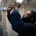 USS Gerald R. Ford (CVN 78) Sailor Conducts Maintenance