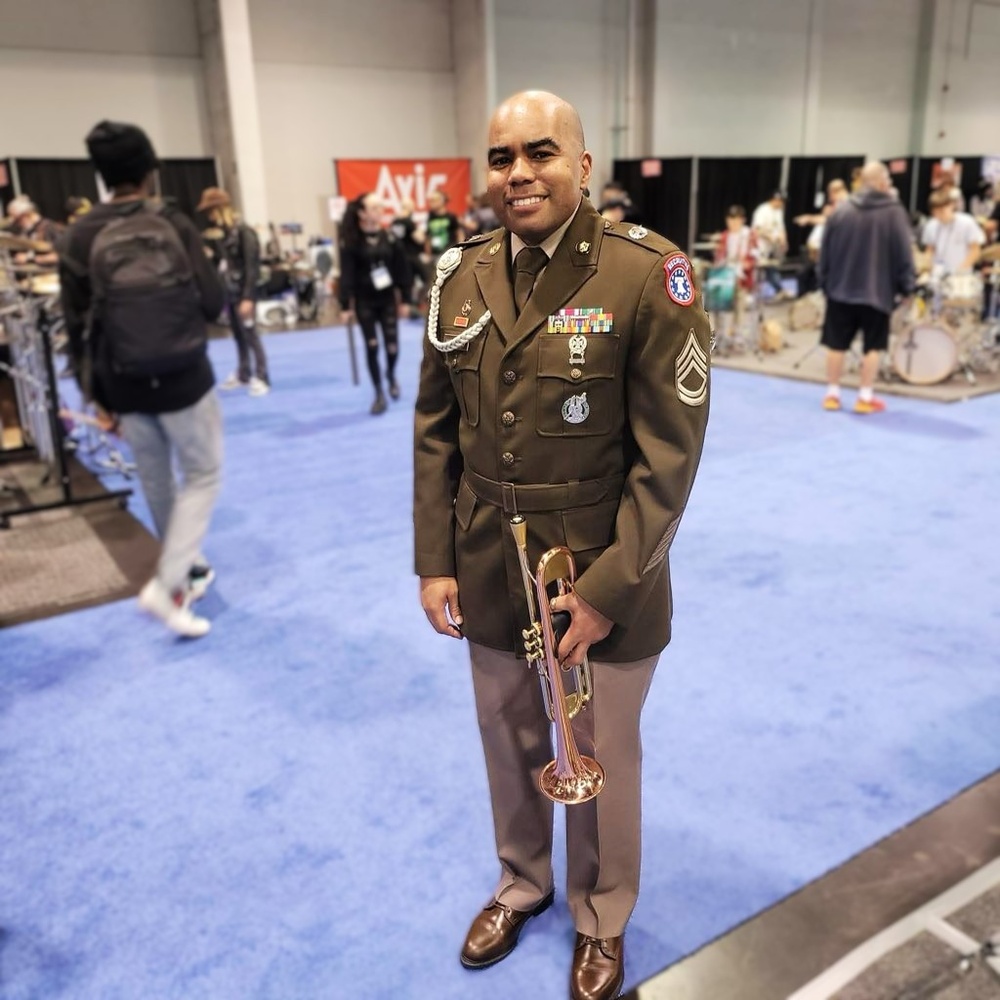 SFC Williams, Army Band Liaison, poses at recruiting event