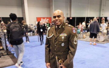 SFC Williams, Army Band Liaison, poses at recruiting event