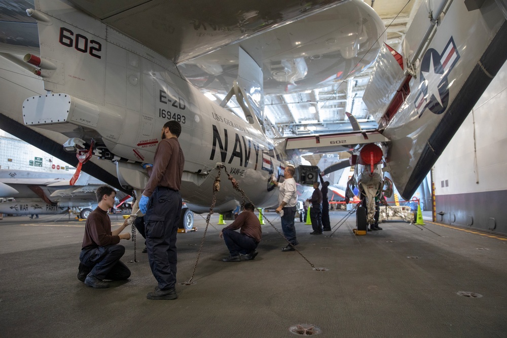 VAW-128 Sailors Preform Maintenance