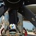 Sailors and contractors prep aircraft for launch