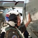 Sailors and contractors prep aircraft for launch