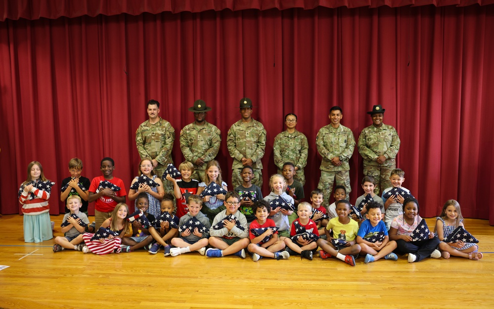 Fort Lee Funeral Honors Team Demonstrate Flag Folding to Youth