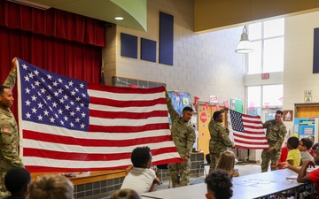 Fort Lee Funeral Honors Team Demonstrate Flag Folding to Youth