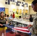 Fort Lee Funeral Honors Team Demonstrate Flag Folding to Youth