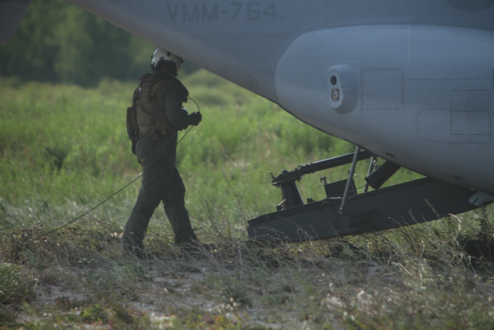 U.S. Marines disembark and offload equipment from an MV-22 Osprey ‘jump’ combat operations center event during Atlantic Alliance 25 (AA25)