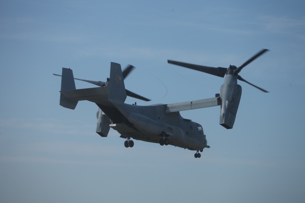 U.S. Marines disembark and offload equipment from an MV-22 Osprey ‘jump’ combat operations center event during Atlantic Alliance 25 (AA25)