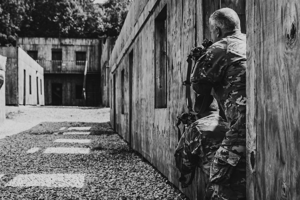 Bravo Company, 1-112 IN BN Conducts Training at Live Fire Shoot House Complex
