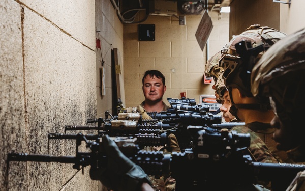 Bravo Company, 1-112 IN BN Conducts Training at Live Fire Shoot House Complex