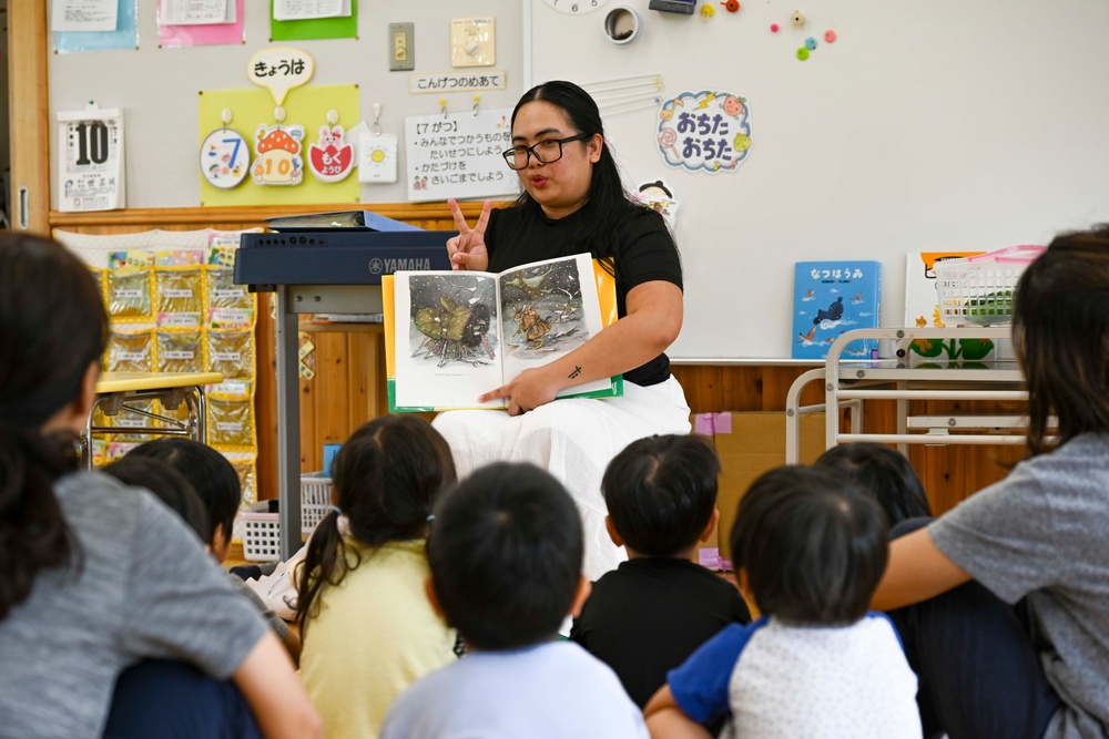 Sailors Share Story Time with Local School Children