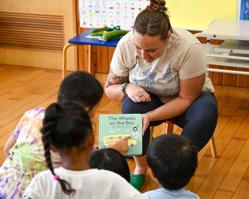 Sailors Share Story Time with Local School Children