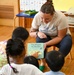 Sailors Share Story Time with Local School Children