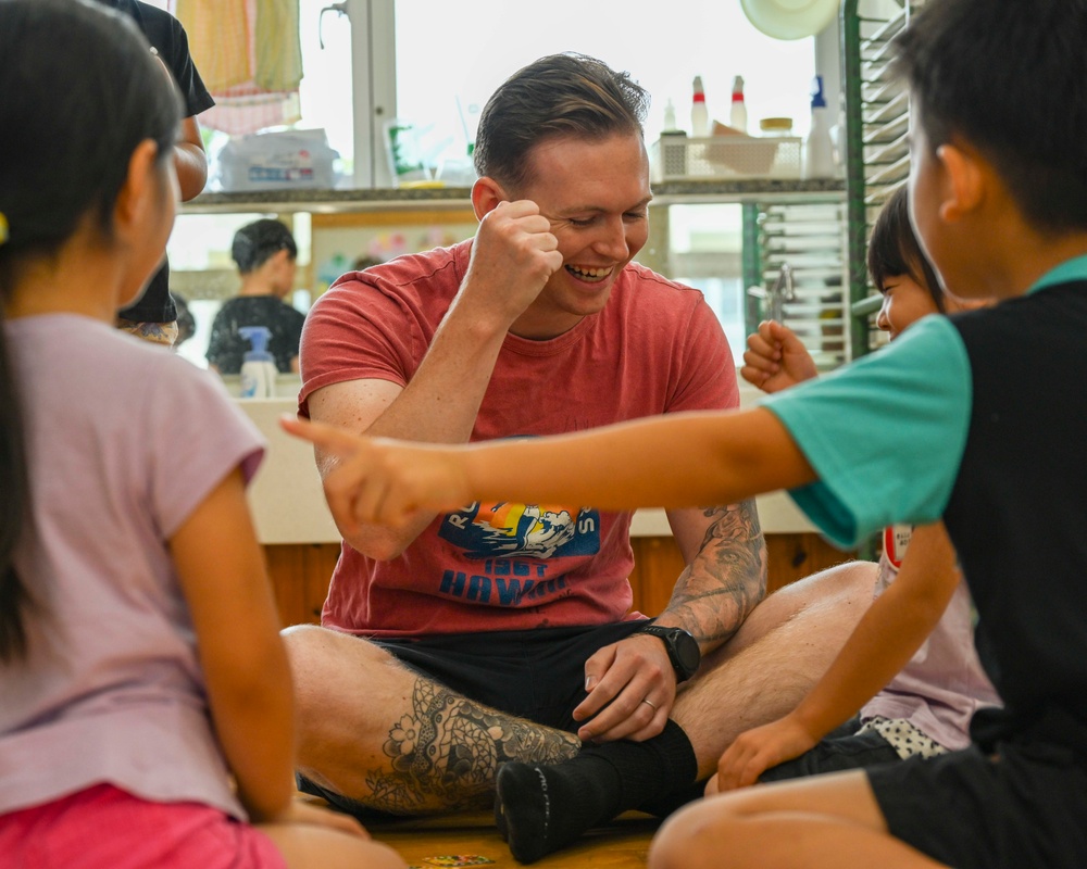 Sailors Share Story Time with Local School Children