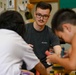 Sailors Share Story Time with Local School Children