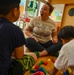 Sailors Share Story Time with Local School Children