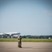 Aircraft 432 lands as maintainers await it's full stop
